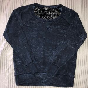 Blue Sweater open back.